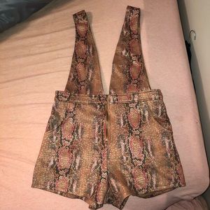 Snake print overall shorts